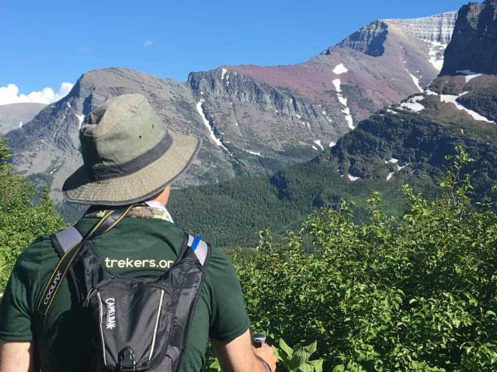 Profile of hiker with mountains