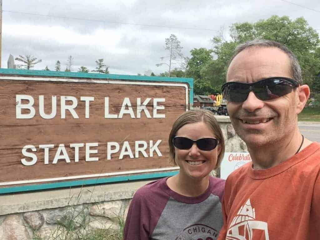 Ari and Jessi at Burt Lake State Park sign