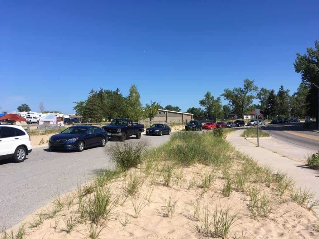 Vehicles lined up to enter Grand Haven State Park