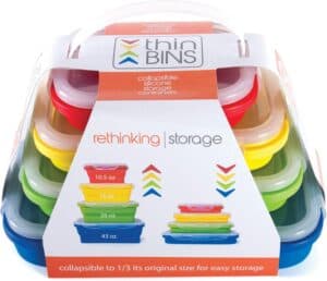 Colorful set of collapsible silicone storage containers by TREKERS, ideal for kitchen organization and food storage.
